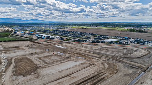 Aerial view of new home construction development in Eagle, Idaho looking towards Boise, Idaho