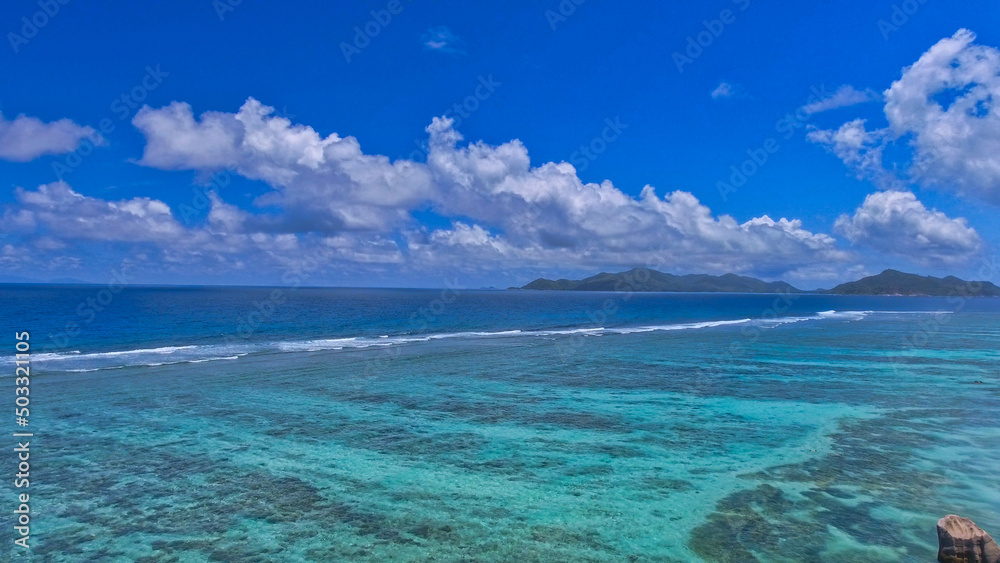 Anse Source Argent, La Digue. Amazing aerial view from drone on a beautiful sunny day Anse Source Argent, La Digue. Amazing aerial view from drone on a beautiful sunny day