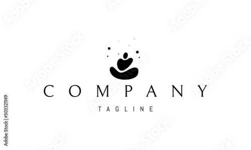 Vector logo on which an abstract image of pebbles in the form of a meditator.