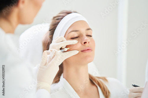 A scene of medical cosmetology treatments botox injection.