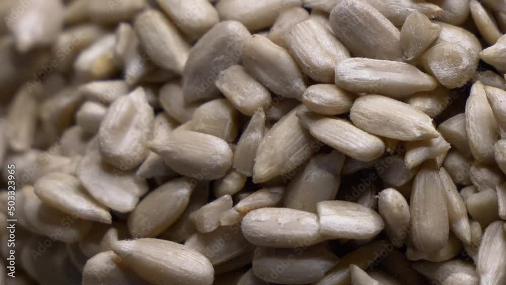 Sunflower seeds without shell, full-frame video full hd. Sunflower seeds close-up, slide shot. Sunflower seeds without shell, full-frame video full hd. Sunflower seeds close-up, slide shot.