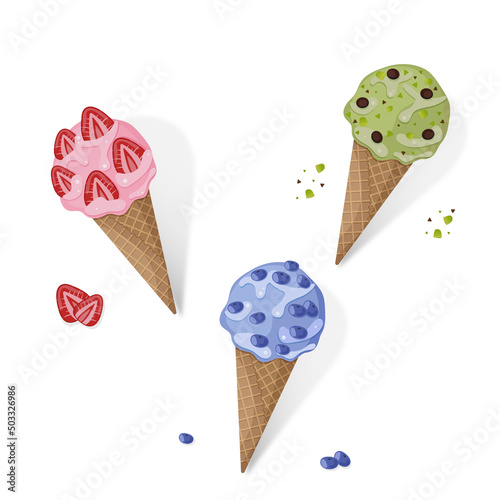 Set of various ice cream in waffle cones with strawberry, blueberry and pistachio