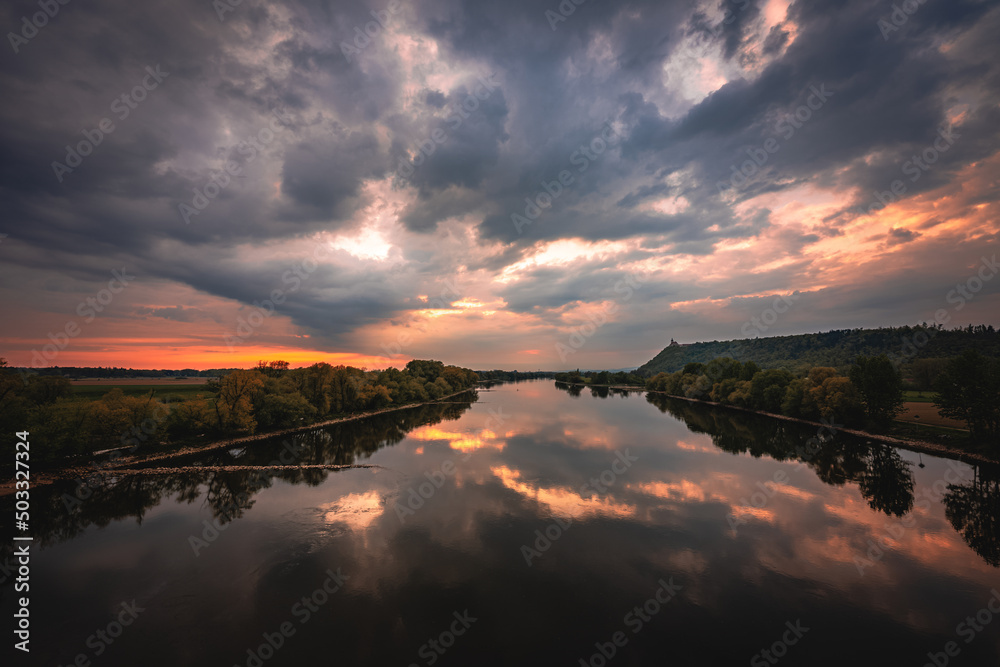 Dark storm clouds in the evening sky at the Danube in Bavaria, Germany