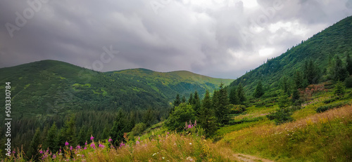 Thunderstorm. The road through the mountains to the lake Nesamovyte. Mountain View