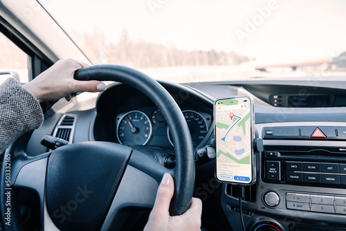 Gps car map system. Global positioning system on smartphone screen in auto car on travel road. Navigation auto location system app.