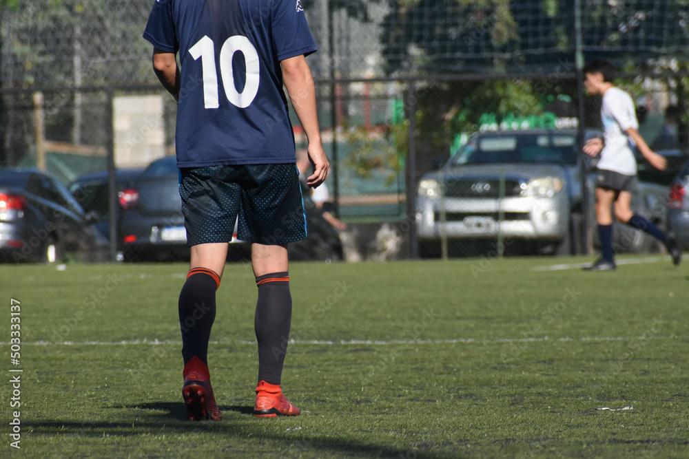 Obraz premium Soccer player walking