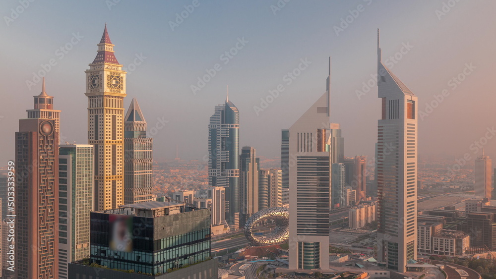 Skyscrapers on Sheikh Zayed Road and DIFC morning timelapse in Dubai, UAE.
