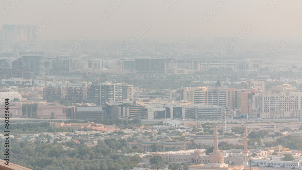 Aerial view of Bur Dubai, the Creek, Deira district and Sharjah timelapse