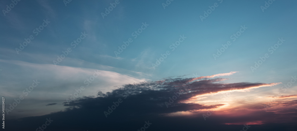 Panoramic banner view of beautiful colourful sunset.