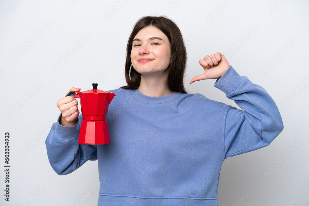 Young Russian woman holding coffee pot isolated on white background proud and self-satisfied Young Russian woman holding coffee pot isolated on white background proud and self-satisfied