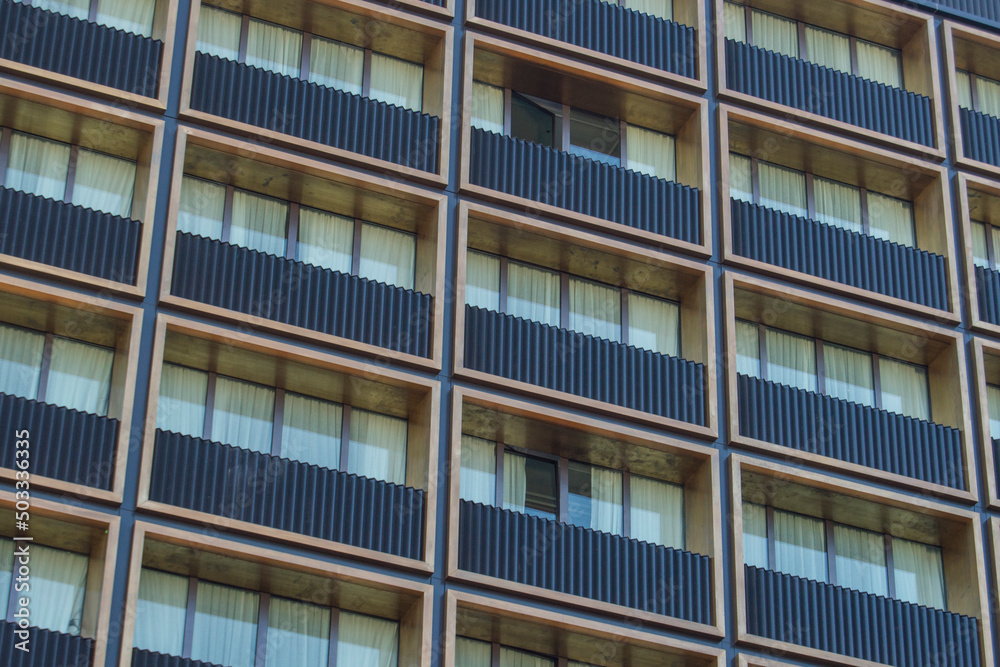 residential building facade with symmetrical balconies residential building facade with symmetrical balconies