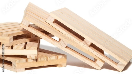 Stacked industrial wooden pallets for isolant cargo