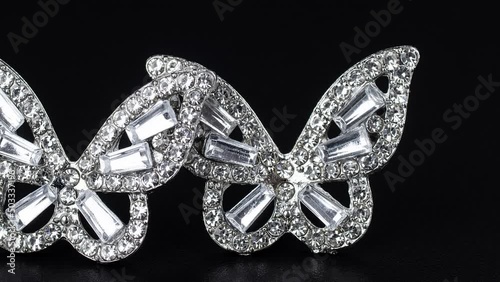 Diamond earrings jewelry, luxury silver and gold earrings with diamonds, sapphires in black background.