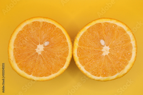 half orange , fresh in season, juicy