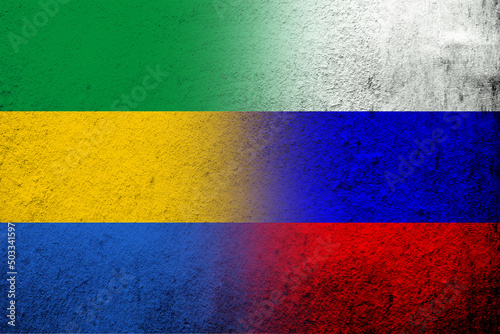 National flag of Russian Federation with National flag of Gabon. Grunge background