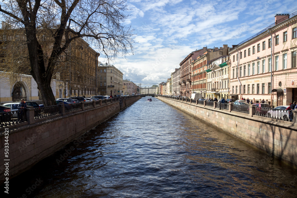 Russia, St. Petersburg - May 1, 2022: View of the embankment of the Griboyedov Canal, the historical center of the city.
