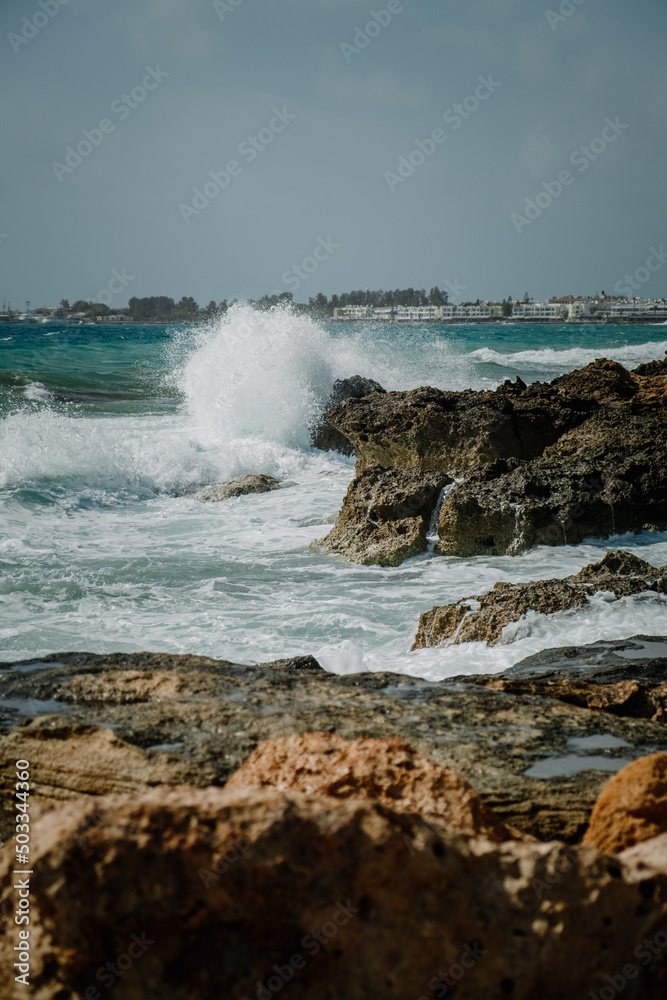 waves crashing on rocks