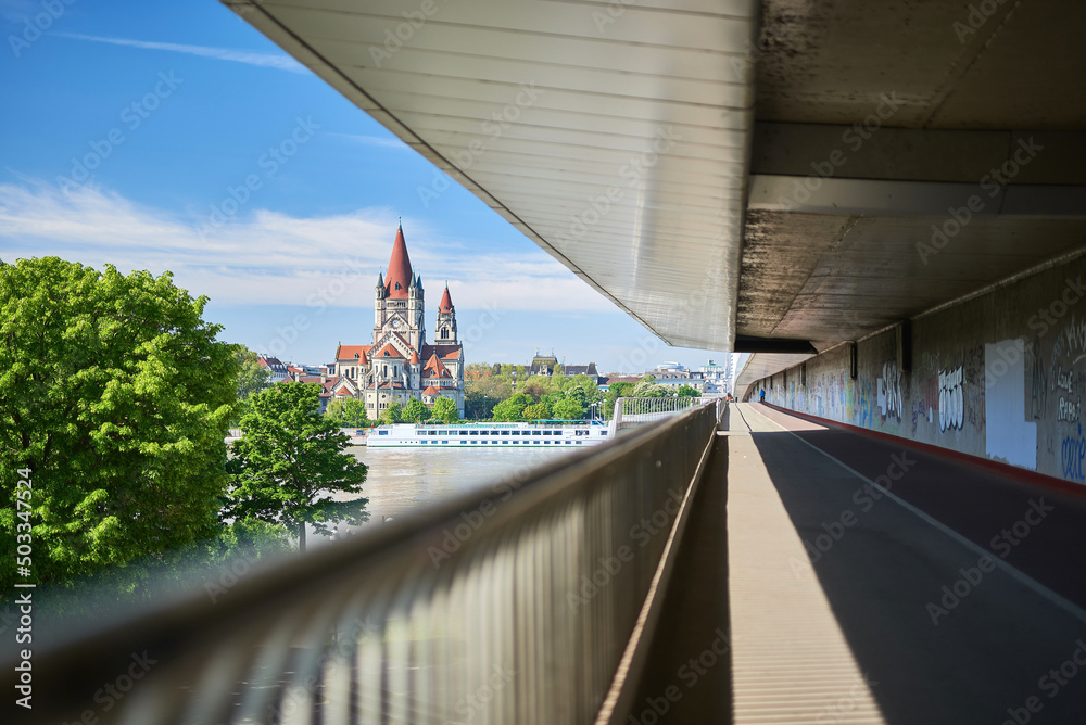 Palace on the Danube in Vienna on a beautiful sunny day surrounded by the beautiful architecture of the bridge