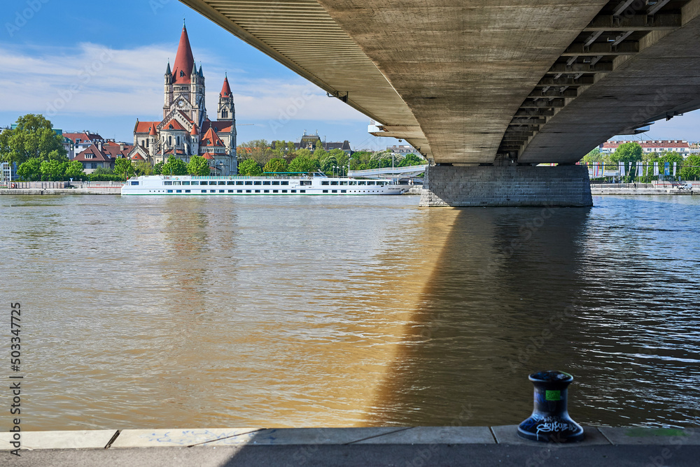 Palace on the Danube in Vienna on a beautiful sunny day surrounded by the beautiful architecture of the bridge