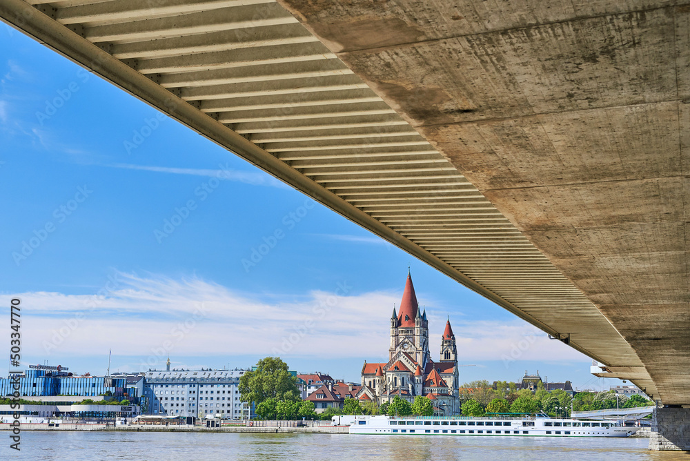 Palace on the Danube in Vienna on a beautiful sunny day surrounded by the beautiful architecture of the bridge