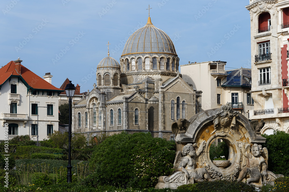 Russian orthodox church ,built in 1892 in Biarritz, France. Historical monument in the foreground. The road leading to the church.