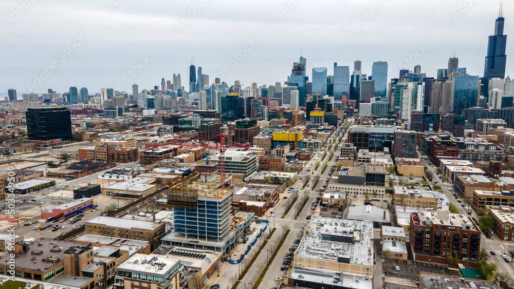 aerial drone shot of Chicago urban city area. the aerial photography of the city is beautiful with skyscrapers and clouds 