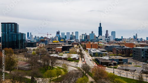 aerial drone shot of Chicago urban city area. the aerial photography of the city is beautiful with skyscrapers and clouds 