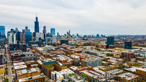 aerial drone shot of Chicago urban city area. the aerial photography of the city is beautiful with skyscrapers and clouds 