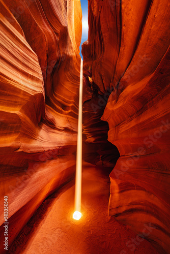 antelope canyon arizona usa. strong and powerful beam of light in the famous antelope canyon.