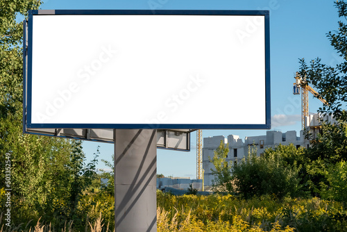 Wallpaper Mural Advertising billboard mock-up near the construction site of modern apartment buildings Torontodigital.ca