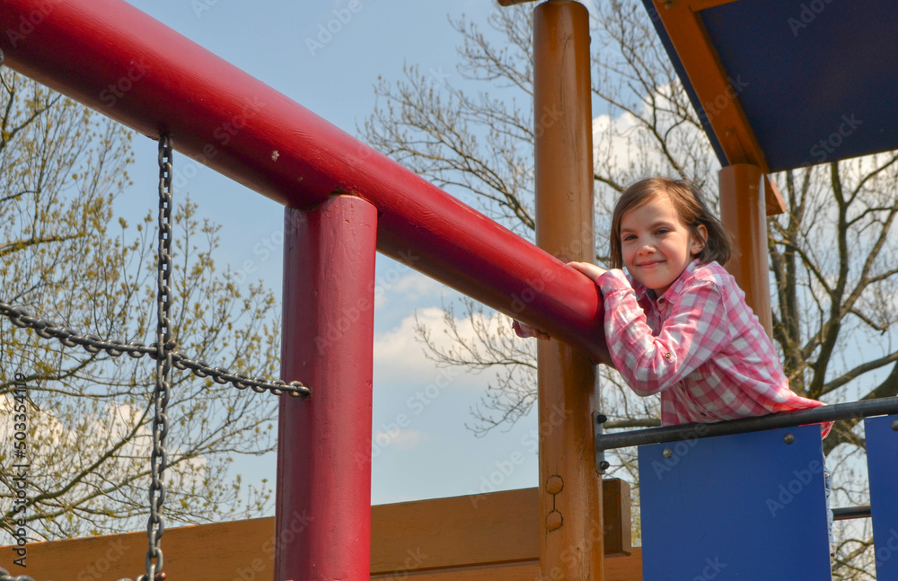 Modern children playground in park. Made in different colors. High quality photo. Modern children playground in park. Made in different colors. High quality photo.