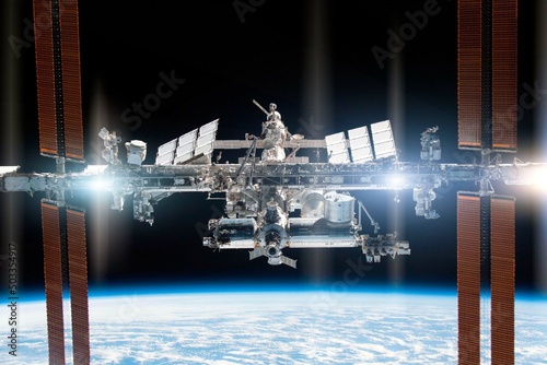 International Space Station in orbit against the backdrop of the planet Earth. Elements of this image furnished by NASA.