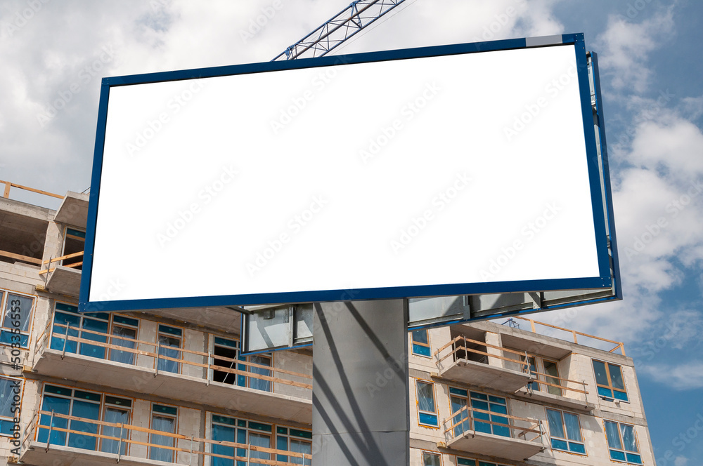Blank white advertising billboard on the construction site Blank white advertising billboard on the construction site