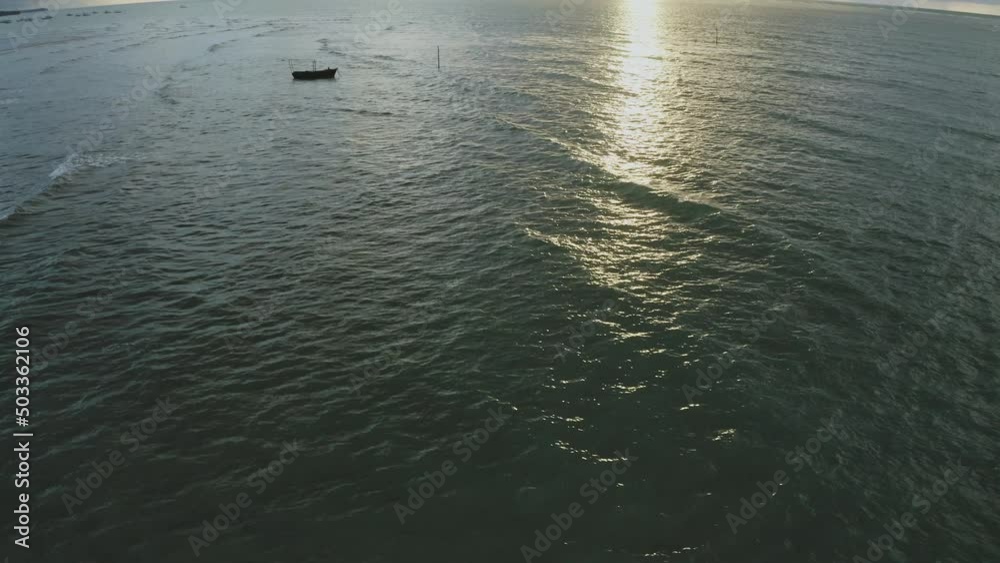 boat clear water sea beach ocean blue aqua sunset aerial drone shot boat clear water sea beach ocean blue aqua sunset aerial drone shot