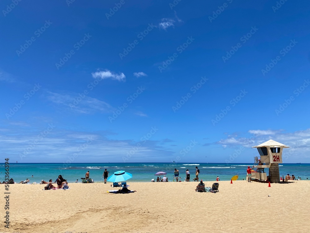 Hawaii beach scene, breezy hot May summer Waikiki Oahu island, year 2022
