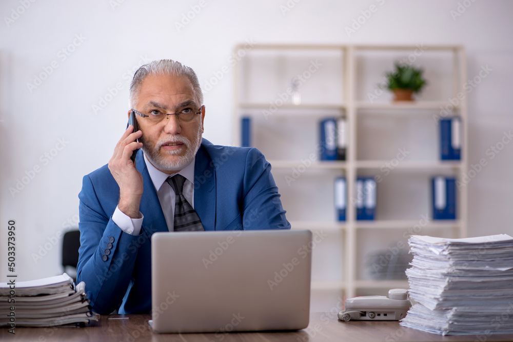 Old male employee and too much work in the office