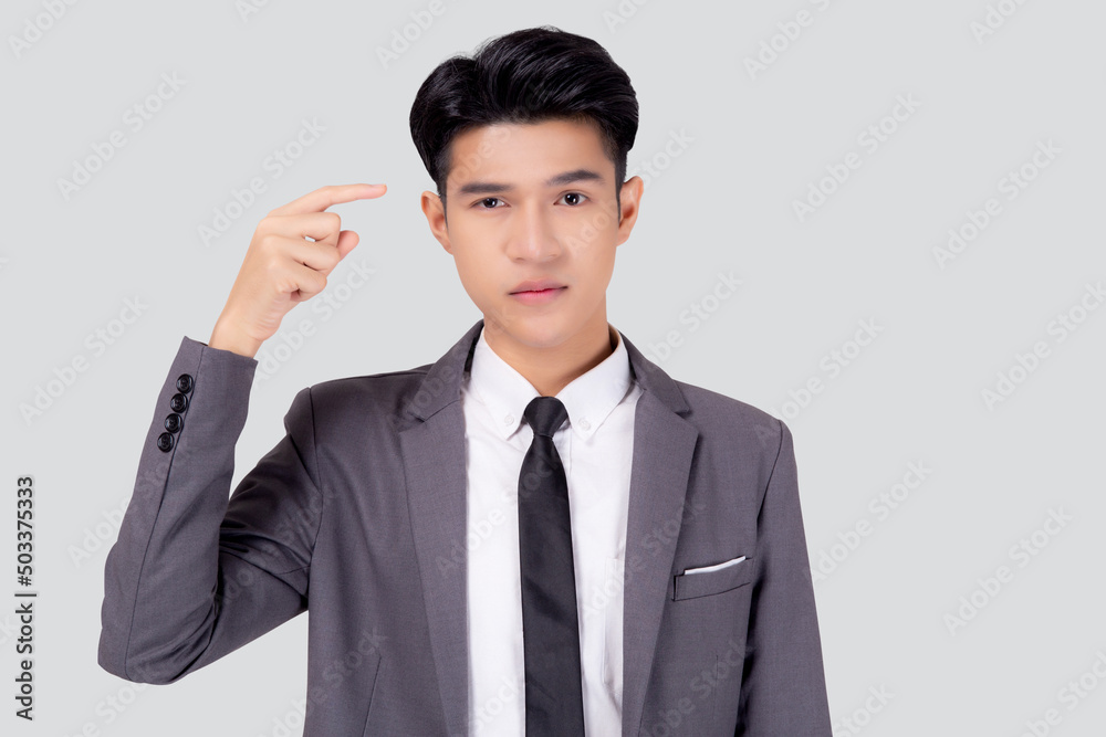 Portrait young asian business man in suit with smart thinking idea with intelligent isolated on white background, businessman standing and planning for success, manager or executive pointing head. Portrait young asian business man in suit with smart thinking idea with intelligent isolated on white background, businessman standing and planning for success, manager or executive pointing head.