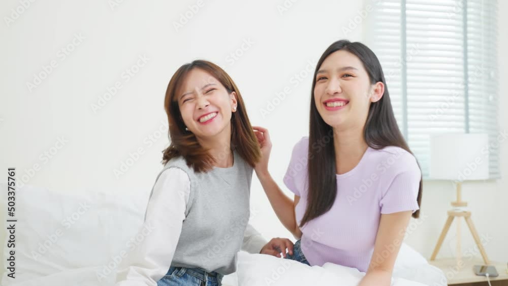 Portrait of Asian beautiful two women friend smiling, look at camera. Portrait of Asian beautiful two women friend smiling, look at camera.