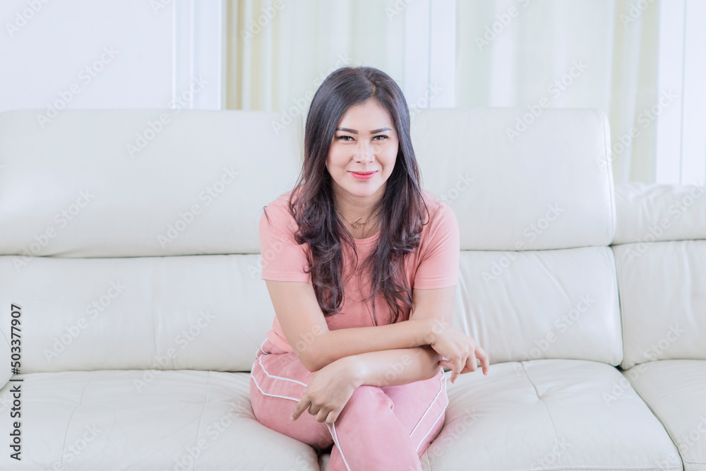 Beautiful woman relaxing on the couch Beautiful woman relaxing on the couch
