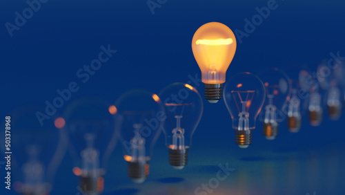 One being on light bulb in rows of darkened lamp, leader innovation concept, 3D rendering. photo