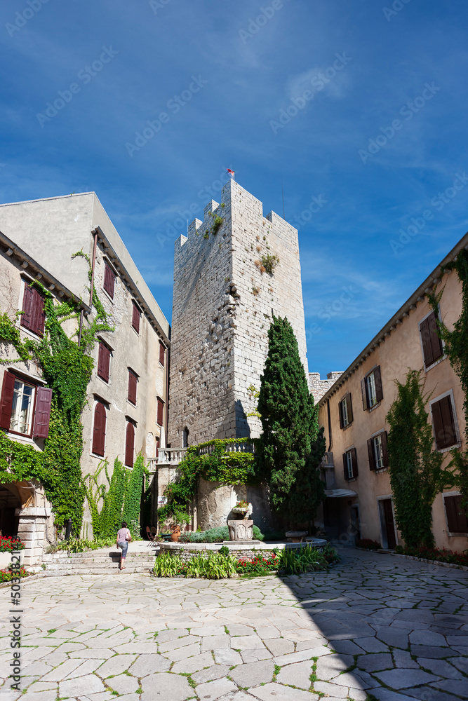 Courtyard of the Gothic Duino Castle on a cliff above the Gulf of Trieste (Adriatic Sea), Italy