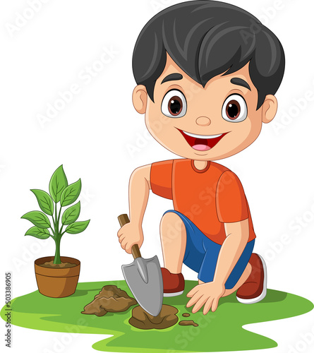 Cute little boy planting plants in the garden