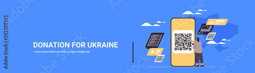 woman scanning qr code on smartphone screen help Ukraine anti war donation to Ukrainian army donate save Ukraine solidarity