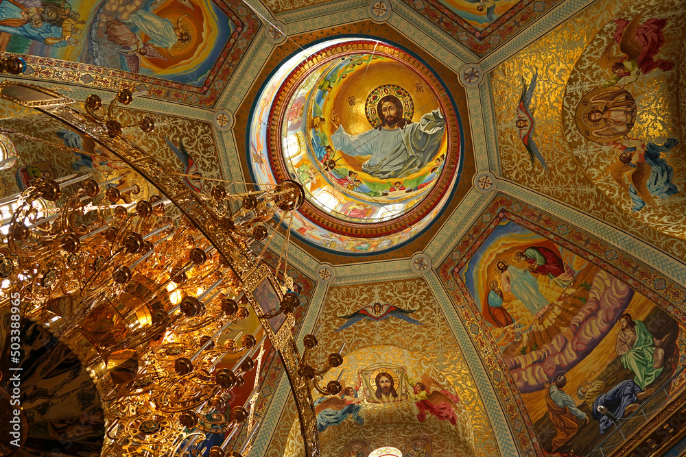 religious buildings. Pochayiv, Ukraine - interior decoration of the cathedral in the Pochaev Lavra. Interior of Holy Dormition Pochayiv Lavra, Ukraine. May 2021