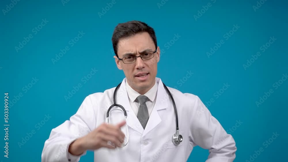 Content doctor gesticulating thumbs up in studio Content doctor gesticulating thumbs up in studio