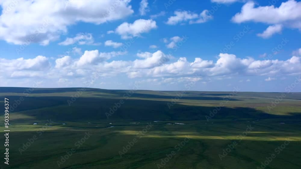 Hyperlapse drone shot of clouds moving over endless Alaskan wilderness - Aerial dronelapse Hyperlapse drone shot of clouds moving over endless Alaskan wilderness - Aerial dronelapse