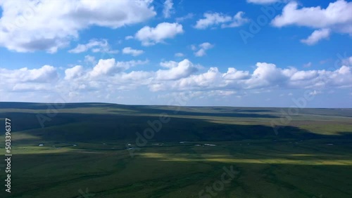 Hyperlapse drone shot of clouds moving over endless Alaskan wilderness - Aerial dronelapse photo