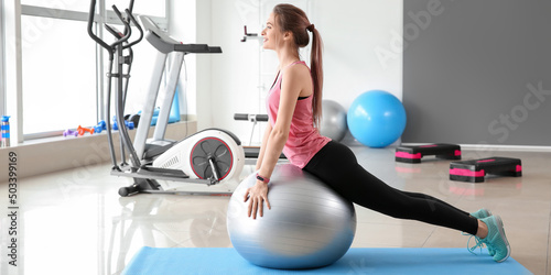 Sporty young woman training...