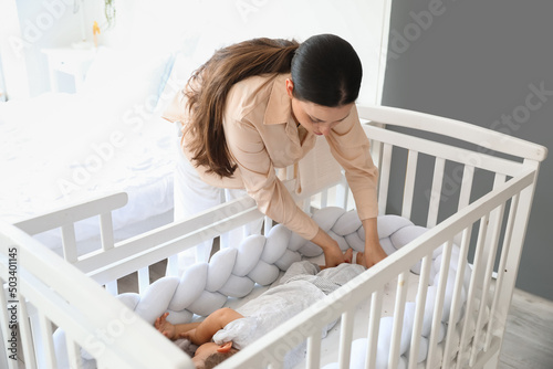 Young mother and her adorab...