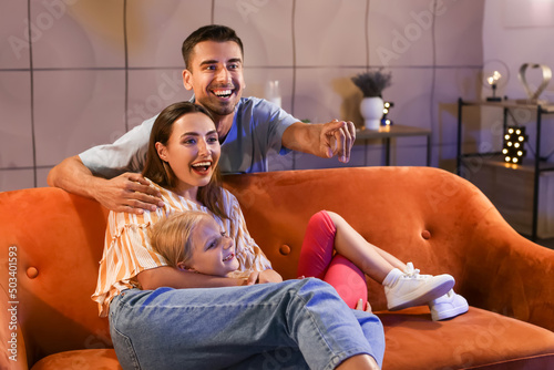 Happy family watching movie...